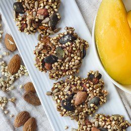 Raw cookie made with sprouted buckwheat, mango, and almonds. Organic, vegan, and gluten-free.