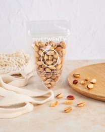 Pistachio nuts in a recyclable zip bag, 100g. Available in salted and unsalted variants.