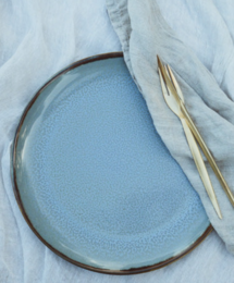 Set of 6 blue ceramic salad plates with a simple, minimalist design and a subtle textured surface. Suitable for everyday use or as part of a modern table setting.