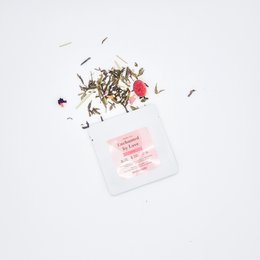 Enchanted by Love mini tea sample, 2-3 grams, featuring a blend of dried flowers, herbs, and fruit pieces for a delicate, aromatic tea experience.