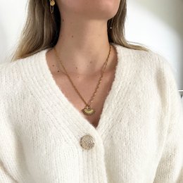 Gold Indiana necklace, pendant with a round, textured pendant on a gold chain.