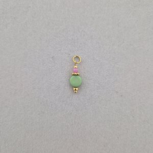 Bedel met groen rondje en roze facetkraaltje