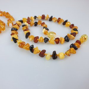 Beißkette aus baltischem Bernstein für Babys