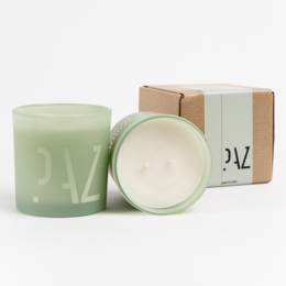 Tall, round, green-colored candle with a bergamot and lemon scent.