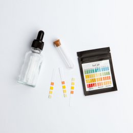 Soil test pH kit for gardening and growing plants. Includes pH testing solution, test strips, and color chart for accurate soil pH measurement.
