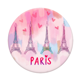  A round pink phone holder with multiple Eiffel Tower icons and the word "PARIS" printed on it. The background features a watercolor-style pink and purple gradient with floating heart shapes.
