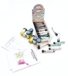 A starter bundle for face care products, including various skincare items and tools. The bundle contains a variety of items in different colors, shapes, and materials to address different skincare needs.