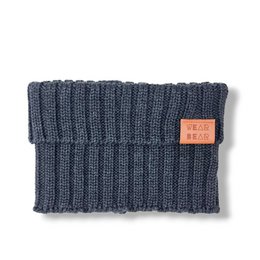 A knitted black chimney-style scarf for kids, featuring a ribbed texture and a leather patch with the brand name.