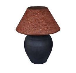 Ceramic table lamp with a raffia shade in a warm, reddish-brown color and a black base.