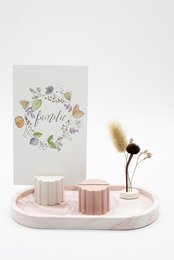 Blush, linen, and sandstone card holder with floral wreath design.