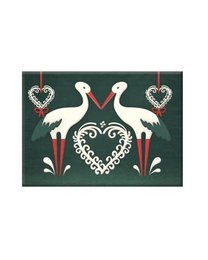 Decorative magnet featuring two white storks with heart-shaped designs, suitable for children's toys or home decor. The image showcases a traditional Alsatian folk art style.