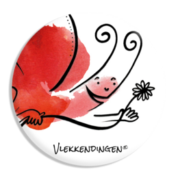 Red butterfly-shaped brooch with black accents and a flower design.