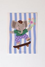 Colorful birthday card featuring a cheerful elephant character holding a skateboard and surrounded by flowers against a striped background.