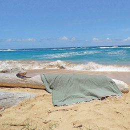 Olive green hammam towel with waffle texture, 100x200cm in size, suitable for use in the bathroom or as a beach towel.