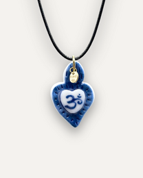 Blue porcelain pendant with sacred heart and Om symbol