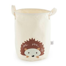 Cream-colored storage basket with a cute hedgehog design, suitable for organizing and storing items in a nursery or bedroom.