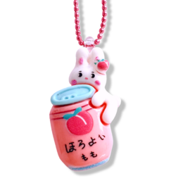 Cute pink and white bunny necklace with peach juice charm, perfect for kids.