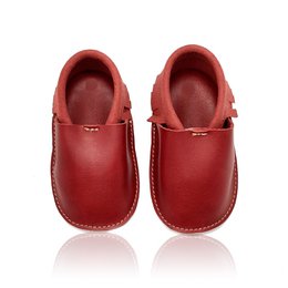 Soft, comfortable baby moccasins in deep red, black, tan, and navy grainy vegetarian leather with soft soles for infants and toddlers up to 32 months old.