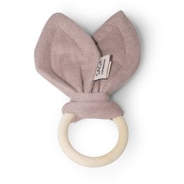 Mauve-colored teething ring made of soft, plush material with a wooden ring for easy gripping. Designed to soothe baby's gums during the teething process.