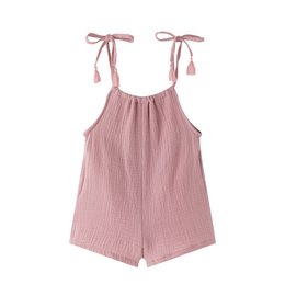  Mauve bambula girls' short jumpsuit with tie shoulder straps and pleated design.