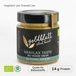 "Gold Leaf Organic Gravlax Button - A savory, creamy spread made from organic gravlax (cured salmon) with a golden color and smooth texture."
The product is a savory spread made from organic gravlax (cured salmon). The spread has a golden color and a smooth, creamy texture. It is suitable for use as a topping or dip.
