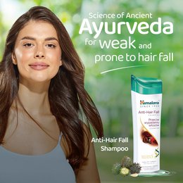  White bottle with teal green cap, anti-hair fall shampoo, herbal formula with natural ingredients, 400ml
