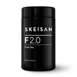 Flavored fruit tea blend with a peach-apricot taste, packaged in a black tea canister.