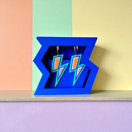  Blue lightning bolt stud earrings, electric flash design, bold geometric shape, vibrant blue color