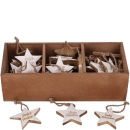 Wooden hanging star ornaments in a variety of designs, including "Merry Christmas" and "Happy Holidays" text. The ornaments are made of a light-colored wood and have a rustic, natural appearance.