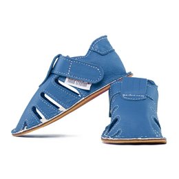 Blue denim slippers with velcro straps and stitched details. Casual and comfortable summer footwear.