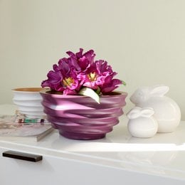 Elegant purple ceramic bowl with a floral arrangement, available in small and medium sizes, suitable for serving fruit, salad, or decorative purposes.