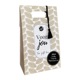 A gift box containing tea, with a white and gray patterned design and the text "For You" prominently displayed. The box includes tea bags and other tea-related accessories.