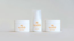 Set of day and night cream in white jars with gold text and logo. Includes a day cream, night cream, and eye cream.
