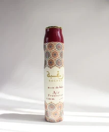Lattafa Raghba Air Freshener 300 ml, a room spray with a hexagonal pattern design, available in a burgundy color.