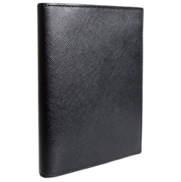 Black leather passport sleeve with saffiano texture, suitable for office use.