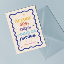  Birthday card with "naps call all parties" text, colorful wavy border design, cream and blue colors, humorous birthday greeting.