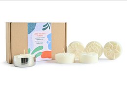 Large tealights made from rapeseed wax with floral designs, suitable for home decor and aromatherapy.