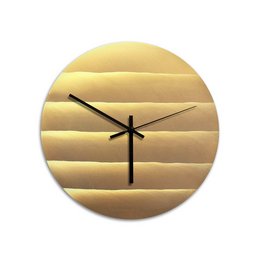 Polished brass wall clock with a 'Waves' design, available in gold, white, and black color variants.