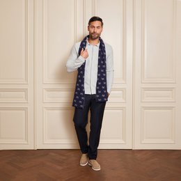  Navy blue scarf with a repeating floral pattern, made by designer Fabrizio by Munir El Haddadi.