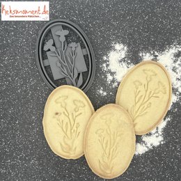 Oval-shaped marigold-themed baking decorations in a black and white design.