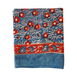  Colorful floral scarf with vibrant sunflowers, leaves, and abstract patterns in shades of blue, yellow, and red.