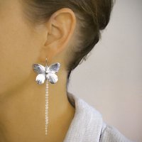 Long-length rhodium plated butterfly earrings