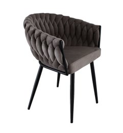 Upholstered dining chair with a wave-like quilted pattern in a sand/taupe color, featuring a sleek black metal frame.