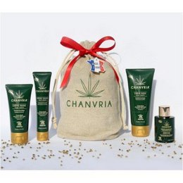Hemp care kit containing hand cream, foot cream, serum, and face cream in a burlap bag.
