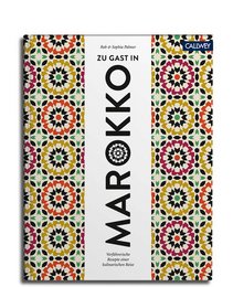 A colorful book cover featuring a geometric pattern with vibrant shapes and colors. The title "Maroko" is prominently displayed in the center.