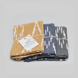 Tea towel, handwoven ikat, ecru v-pattern on navy blue