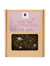 Sweet tea, herbal tea blend with rose petals and chamomile flowers.