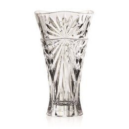 Tall, clear glass vase with intricate star-shaped pattern.