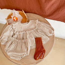 A striped dress and panty set for kids, available in coffee and stone colors, with sizes ranging from 3-6 months to 2-3 years.