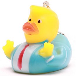  Turquoise rubber duck with a wave pattern design, suitable for use in a child's bath.
